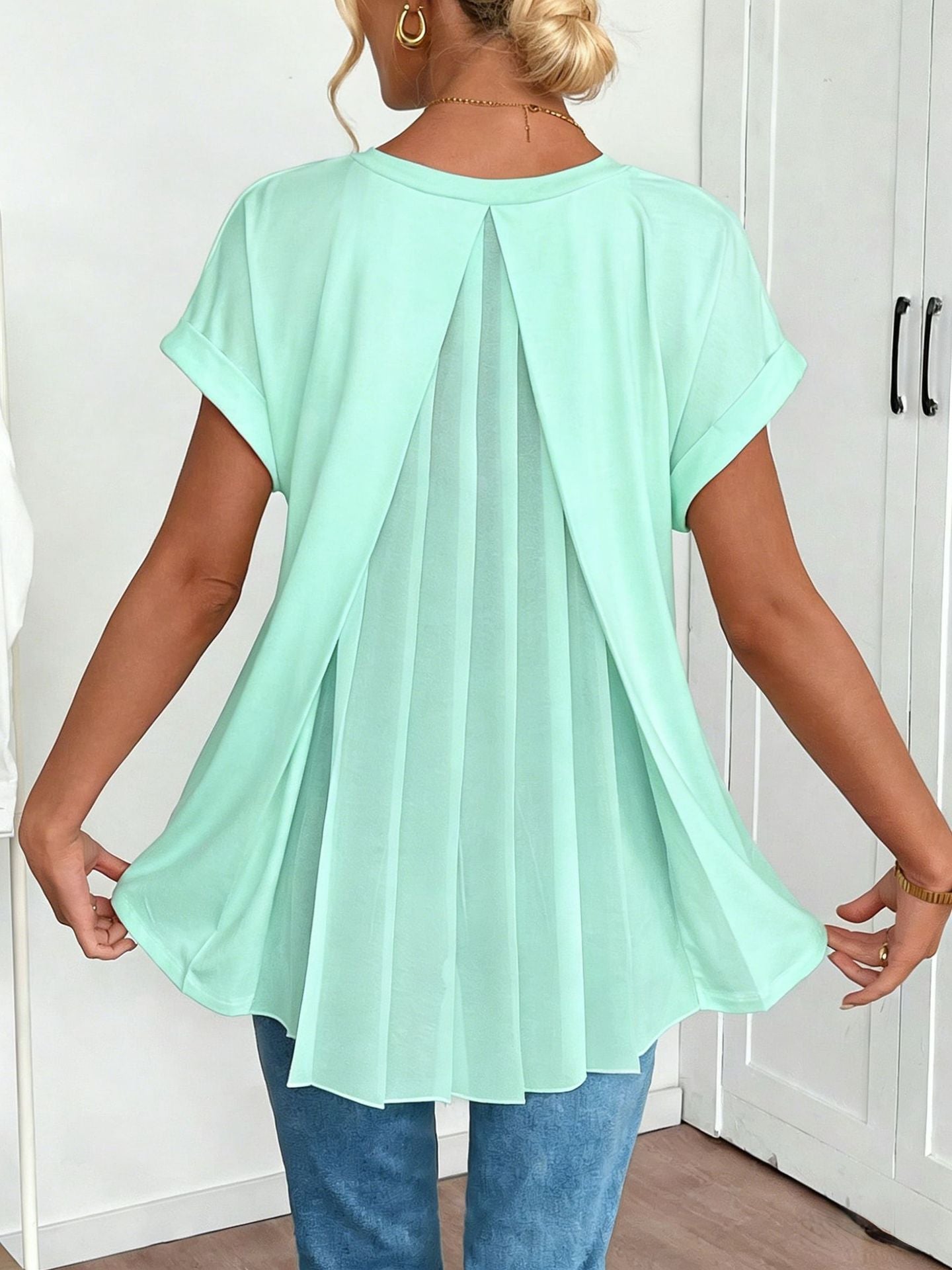 Women's V-neck short-sleeve top with back pleats