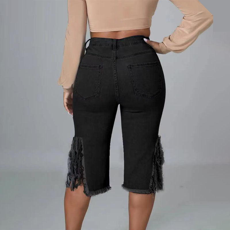 High-waisted ripped fringed denim capri pants
