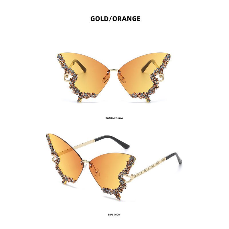 Butterfly-shaped sparkling rhinestone-rimmed sunglasses