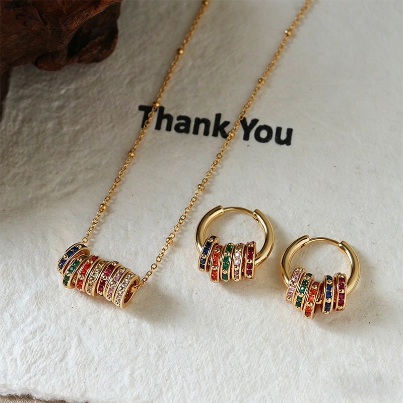 Rotating colored zircon necklace and earring set