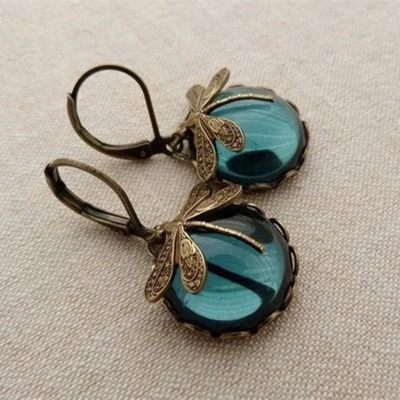 files/Pendientes-de-lib-lula-de-bronce-Vintage-para-mujer-aretes-de-moda-de-Color-dorado-con.jpg_Q90.jpg__1_769cf977-fe40-44c8-b1d6-b29cb8638fd1.webp