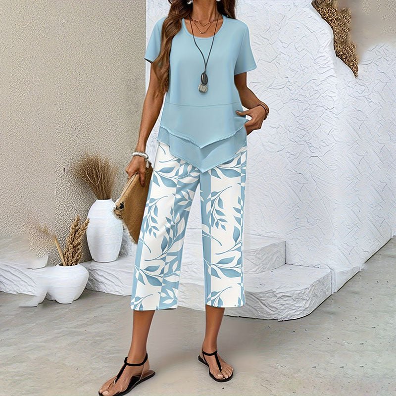 Layered-look hem T-shirt and leaf-print cropped pants set
