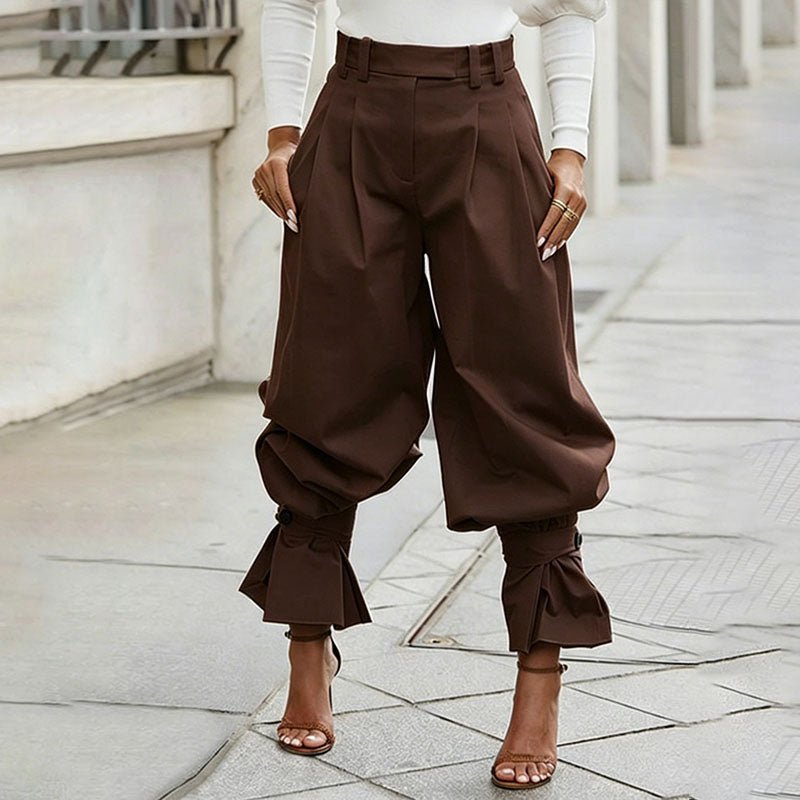 High-waisted loose-fit ruffled trousers