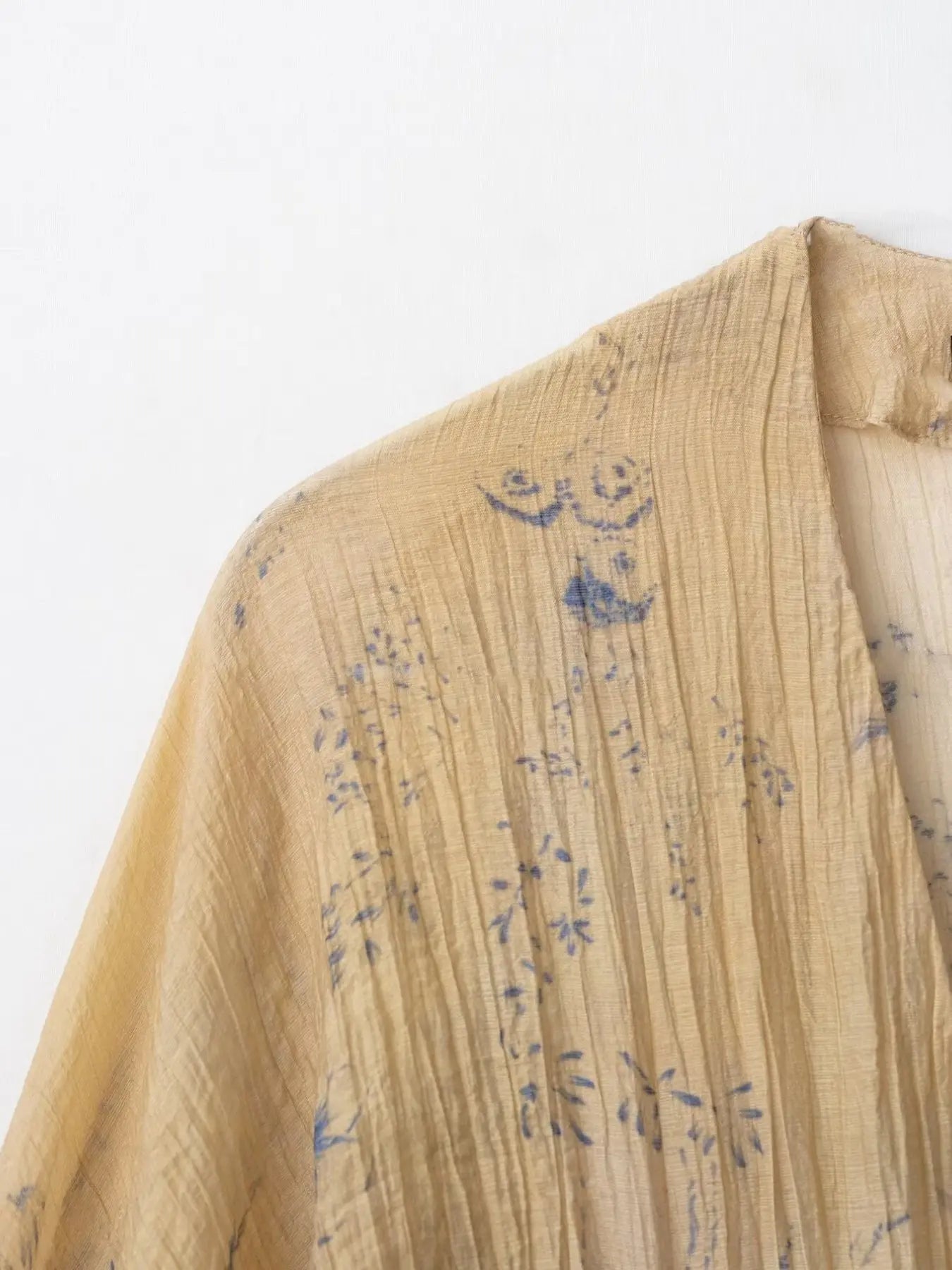 The Elara Vintage Floral Smocked Top